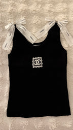 Top noir à nœuds blancs amovibles