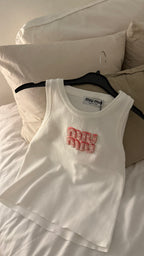 Top blanc MiuMiu a diamant rose